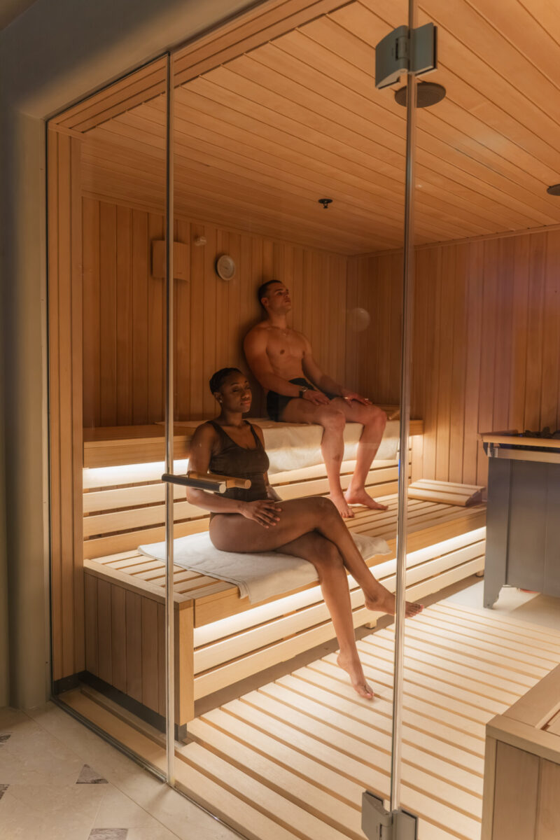 guests unwinding in the spacious sauna